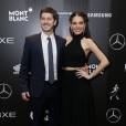 Julia Konrad, a Ciça em 'Malhação', foi ao evento acompanhada do seu namorado, o ator Caio Paduan, e apostou em um top cropped, saia midi e pump nude para o look da noite