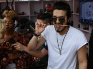 Luan Santana lança clipe em comunidade do Rio e come churrasquinho com farofa