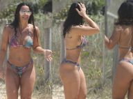 Viviane Araujo mostra corpo definido e bebe cerveja em praia do Rio. Fotos!