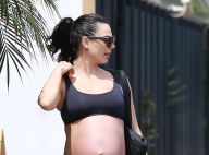Isis Valverde, aos 9 meses de gravidez, exibe barrigão ao deixar academia no Rio