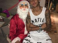 Neymar senta no colo do pai vestido de Papai Noel e comemora: 'Feliz Natal'