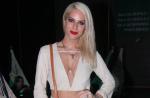 Giovanna Ewbank usa decote profundo e short curto no Fashion Rio. Veja looks!