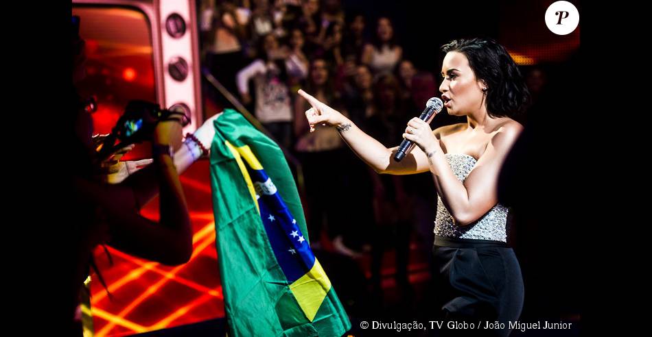 Demi Lovato escolheu o Brasil pata lançar seu novo álbum e participou do 'Caldeirão do Huck'