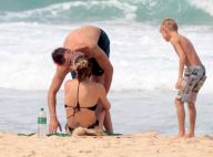 Fernanda Lima troca beijos com Rodrigo Hilbert em dia de praia com filhos. Fotos