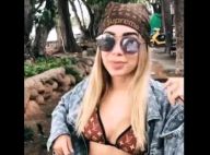 No Havaí, Anitta monta look com biquíni, jaqueta e tênis Louis Vuitton. Confira!