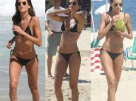 Izabel Goulart mergulha, toma ducha e bebe água de coco em praia no RJ. Fotos!