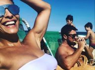 Juliana Paes elogia marido em foto na praia com os filhos: 'Fica sexy comendo'