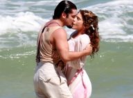 Isabella Santoni e Bruno Gissoni se beijam em gravação de novela na praia. Fotos