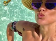 Flávia Alessandra posa de biquíni com mangas e exibe corpo musculoso em viagem