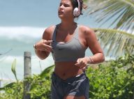 Giulia Costa corre na orla, retoca bronzeado e beija DJ em praia do Rio. Fotos!