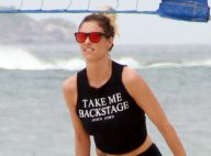 Fernanda Lima deixa barriga de fora e exibe boa forma ao jogar vôlei de praia