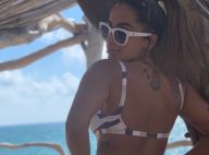 Anitta deixa bronzeado à mostra em viagem e ganha elogio: 'Mulherão'. Fotos!