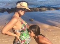 Grávida, Ivete Sangalo tem barriga beijada pelo filho, Marcelo, em praia: 'Amor'