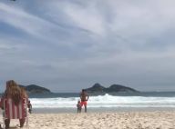 Mariana Bridi mostra Rafael Cardoso brincando com filha, Aurora, na praia. Vídeo