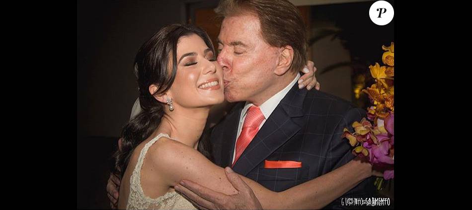Renata Abravanel recebe o carinho pai, Silvio Santos, no dia de seu casamento, realizado no último sábado, 26 de setembro de 2015