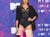 Anitta aposta em bota de couro com cetim que vai até o quadril e custa R$ 14 mil