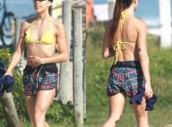 Solteira, Pérola Faria exibe boa forma de biquíni em caminhada na orla da praia