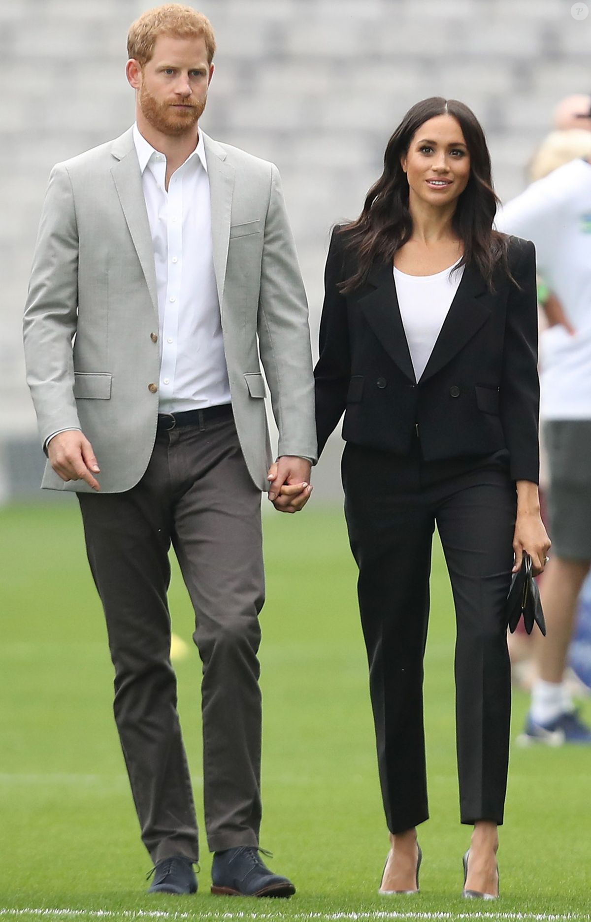 Foto Meghan Markle e Príncipe Harry deram auxílio aos desabrigados em