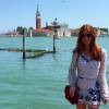 A ruiva arrasou nas fotos durante viagem à Itália