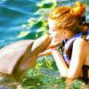 Em viagem aos Estados Unidos, Marina tirou foto beijando um golfinho. Fofos!