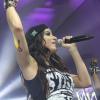 Anitta exibe a nova tatuagem de chave durante show em Campinas, em São Paulo, na sexta-feira (27)