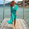 Em passeio na Tailândia, Marina Ruy Barbosa apostou em saída de praia verde, de renda, da Gluck Beachwear, vendido R$ 408 no site da marca