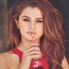 Selena Gomez destronou Justin Bieber com foto de uma campanha para a Coca-Cola e bateu recorde, batendo mais de 4,4 milhões de curtidas