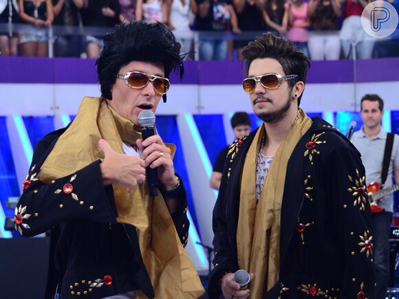 Luan Santana gravou com Rodrigo Faro o programa 'O Melhor do Brasil', que será exibido no próximo domingo, 23 de março de 2014. Ao lado do apresentador, o cantor sertanejo foi desafiado e topou se caracterizar como Elvis Presley