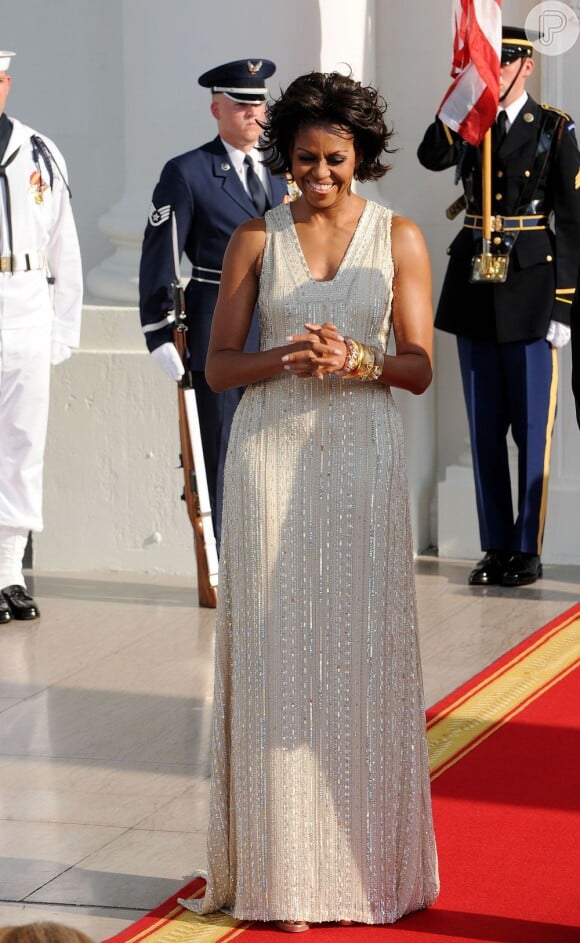 Para receber chanceler alemã Angela Merkel, Michelle Obama escolheu um vestido todo trabalhado em paetês, a recepção aconteceu na Casa Branca, em 2011