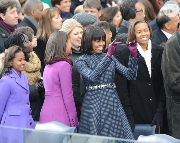 Michelle Obama escolheu um vestido e casaco do estilista Thom Browne para a cerimônia pública de posse do segundo mandato de Barack Obama, em 21 de janeiro de 2013. O colar foi desenhado por Cathy Waterman