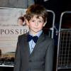 O pequeno Oaklee Pendergast, que interpreta o terceiro e último filho do casal na trama, participa da pré-estreia do filme 'O impossível'