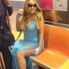 Mariah Carey anda de metrô em Nova York, nos Estados Unidos, depois participar do baile de gala beneficente Fresh Air Fund, em 29 de maio de 2014