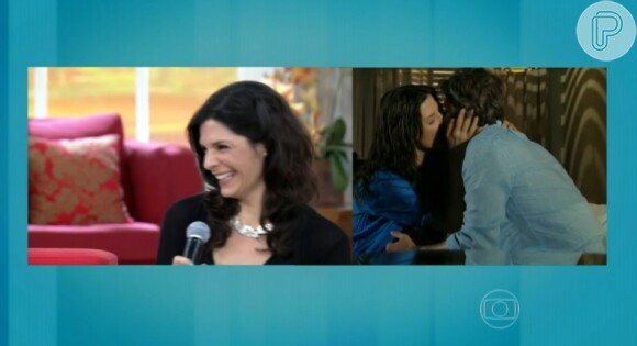 Helena Ranaldi se diverte ao assistir a cena de beijo entre sua personagem Verônica de 'Em Família' e Cadu (Reynaldo Gianecchini)