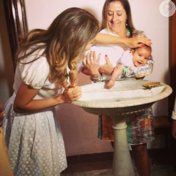 Nivea Stelmann batiza a filha caçula, Bruna, de seu casamento com Marcus Rocha no Rio de Janeiro, neste sábado, 12 de julho de 2014