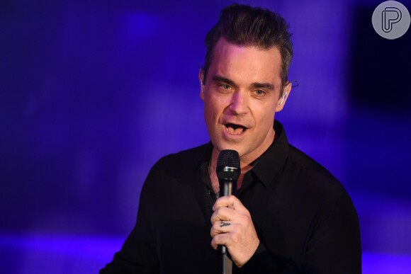 'Eu estava sob pressão porque eu tinha apenas um minuto para acabar', disse Robbie Williams