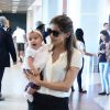 Nivea Stelmann foi clicada com a filha Bruna, de apenas 4 meses, no aeroporto Santos Dumont, no Rio, na manhã desta quarta-feira, 6 de agosto de 2014