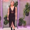 Giovanna Antonelli posa com lingerie à mostra e look all black
