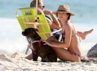 Que amor! Solteira, Juliana Paiva curte praia com seu cachorro: 'Love'