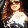 Anitta compartilhou uma foto no Instagram na qual aparece após fazer seus votos