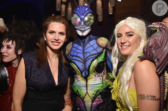 Heidi Klum recepciona os seus convidados vestida 'mosca-varejeira'