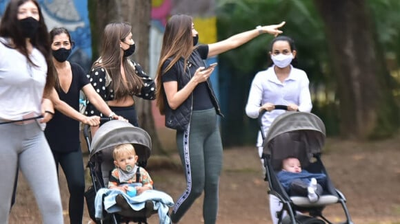 Grávida, Romana Novais caminha com família em parque de São Paulo. Fotos!