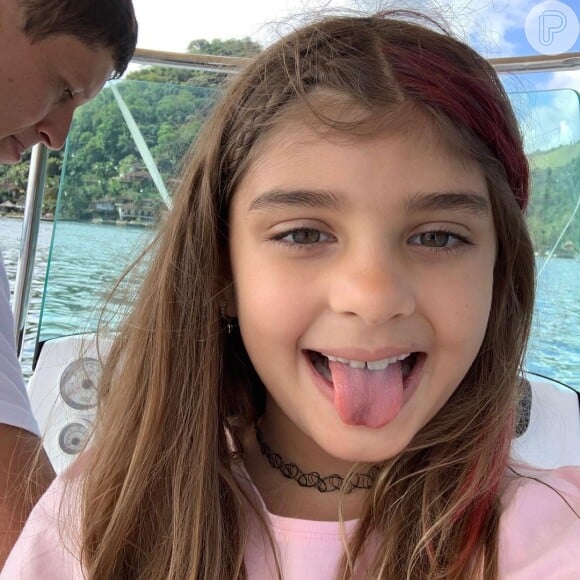 Nas fotos, Sofia, filha de Cauã Reymond e Grazi Massafera, aparece fazendo caras e bocas