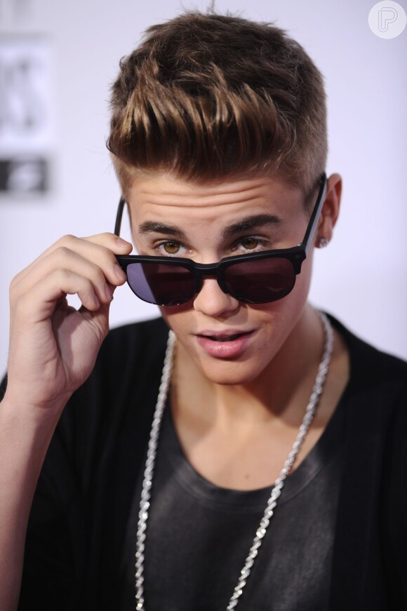 Justin Bieber também desmaiou durante o segundo show e brigou com um paparazzo assim que recebeu alta do hospital