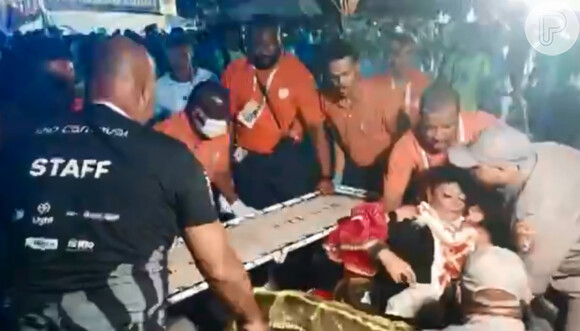 Acidente no carnaval da Paraíso do Tuiuti: Alba Regina Gomes passou mal no fim do desfile, foi colocada em cadeira de rodas, mas acabou atingida por carro alegórico