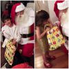Carol Celico mostra os filhos, Luca e Isabella, abrindo os presentes de Natal. Ela passou a data comemorativa ao lado de Kaká