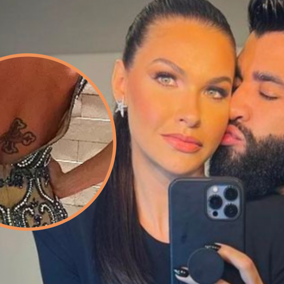 Gusttavo Lima e Andressa Suita: mais uma tatuagem de casal! Modelo e cantor têm cruz tatuadas nas costas. Fotos e detalhes