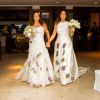 Daniela Mercury e Malu Verçosa se casaram usando modelos parecidos de vestidos de noiva