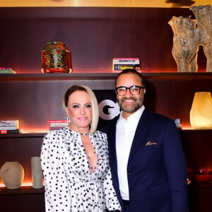 Fábio Arruda e Ana Maria Braga esbanjaram sorrisos e bom estilo em evento anual da Revista GQ