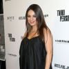 Mila Kunis não engordou muito durante a gravidez da primeira filha. Na foto, a atriz comparece a um evento em junho, quatro meses antes de dar à luz