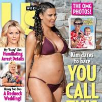 De biquíni, Kim Kardashian exibe barrigão de grávida em capa de revista